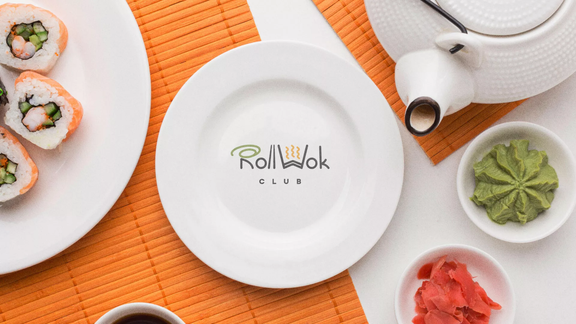 Разработка логотипа и фирменного стиля в Черняховске для суши-бара «Roll Wok Club» Разработка логотипа и фирменного стиля в Черняховске для суши-бара «Roll Wok Club»